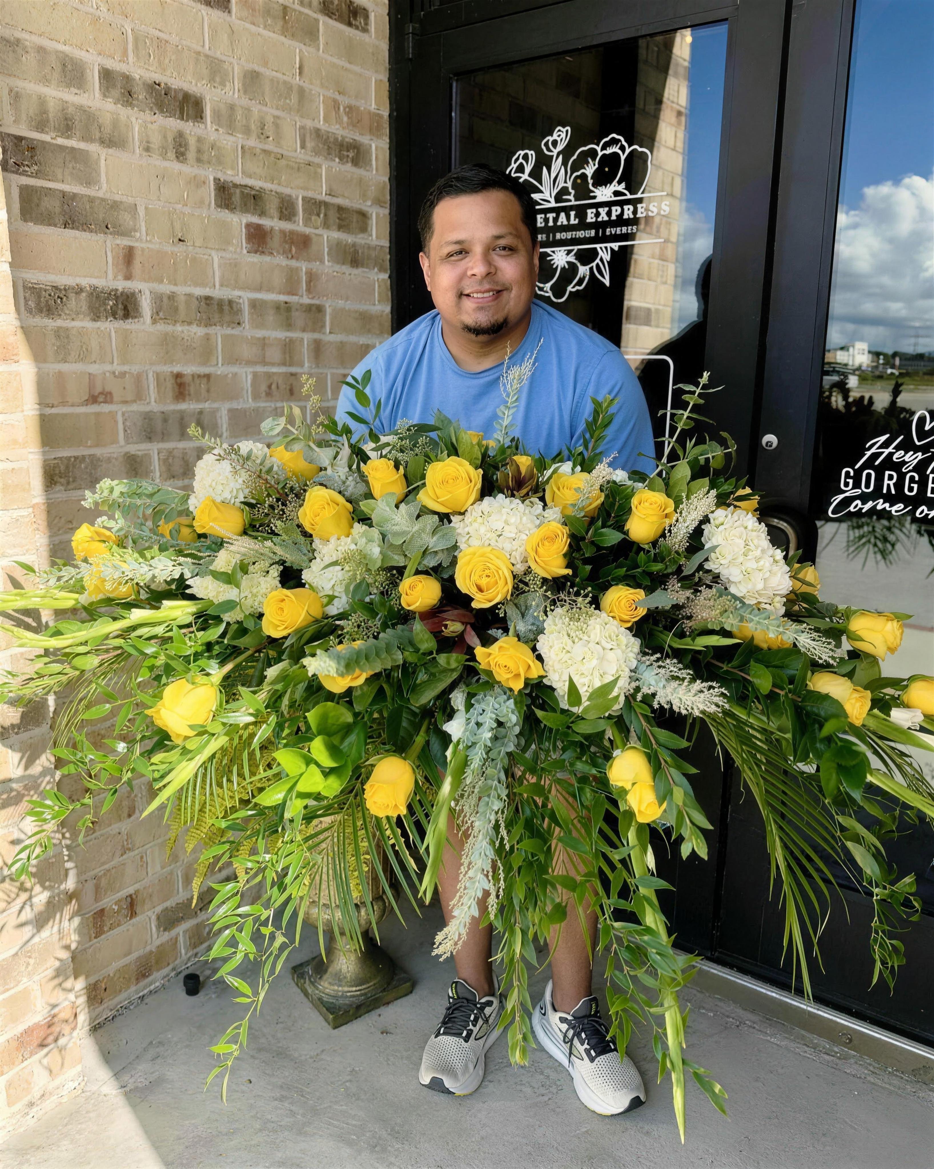 Adrian at The Petal Express storefront in Victoria, Texas