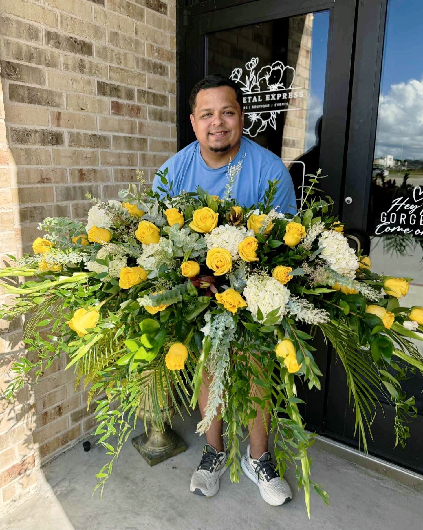 Adrian at The Petal Express storefront in Victoria, Texas