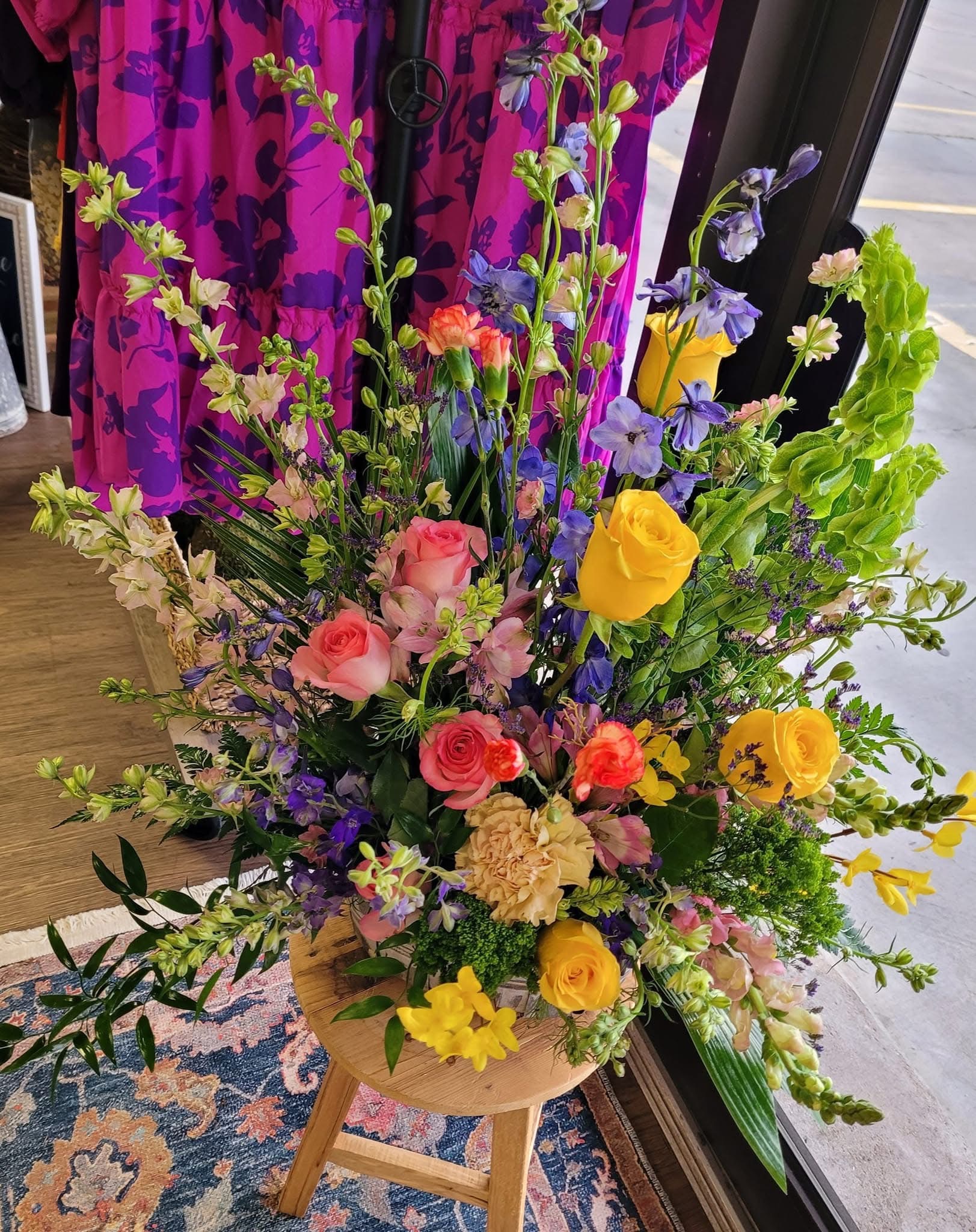 A grand designed arrangement crafted for a Petal Express event